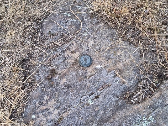 Environment Agency on Rock Outcrop